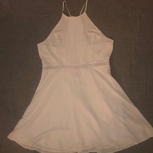White A-line mini dress with lace cut out